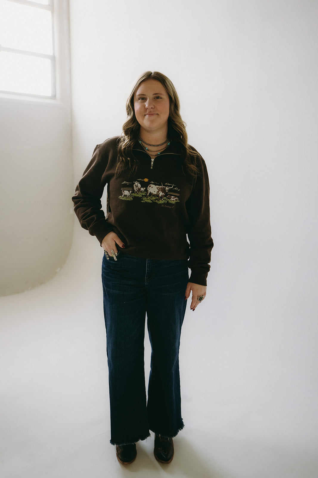 The Sandra Cow Scene Quarter zip