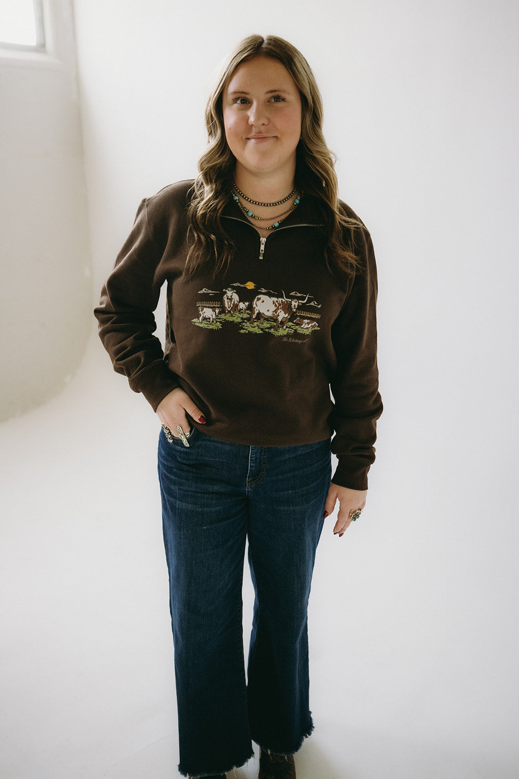 The Sandra Cow Scene Quarter zip