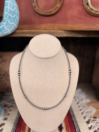 The 20” graduated pearl necklace