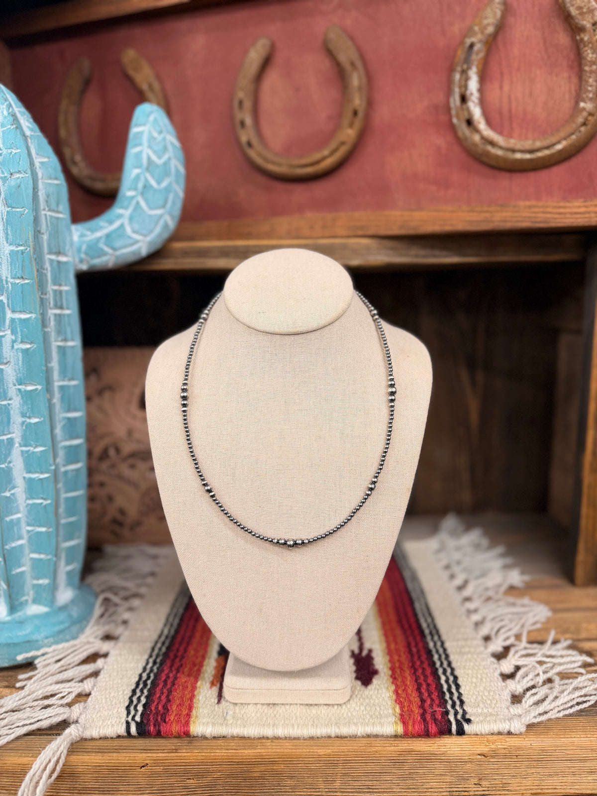 The 20” graduated pearl necklace