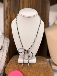 The June Bug Bow Pearls