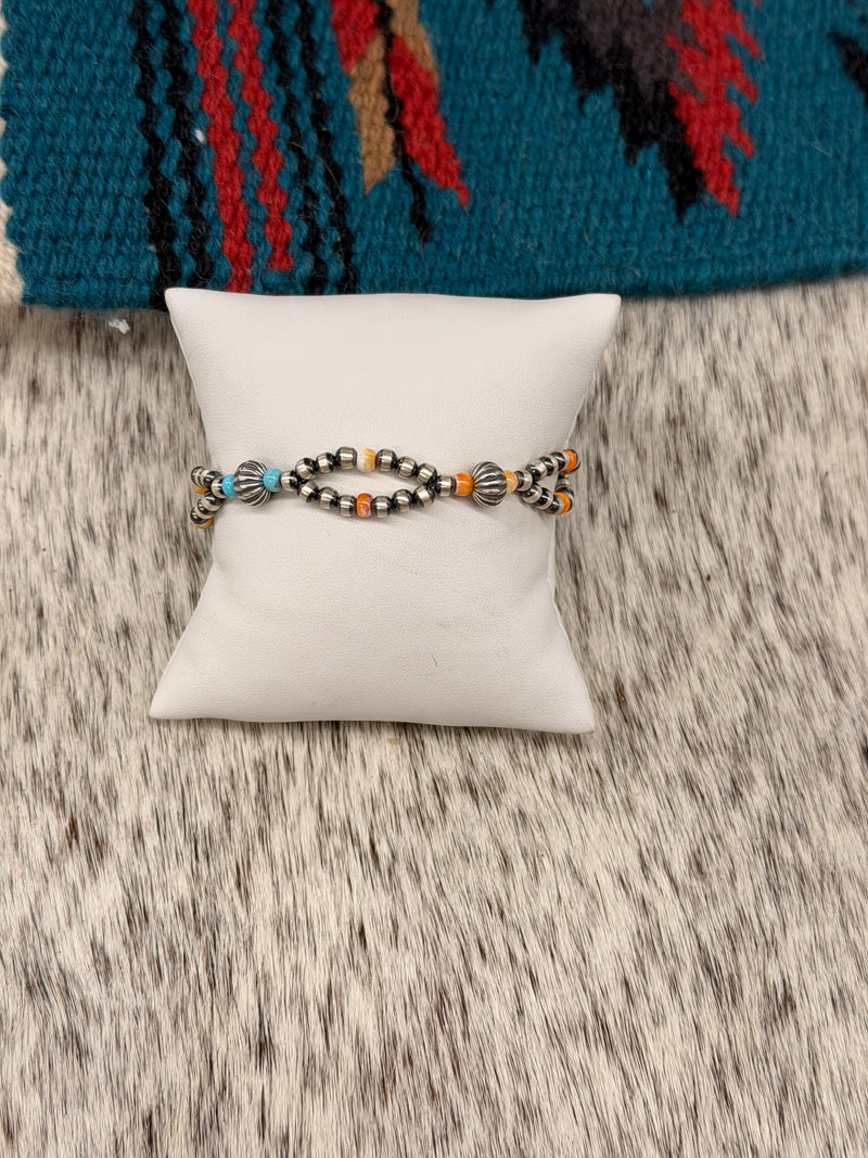 The Orange Spiny x Turquoise looped bracelet