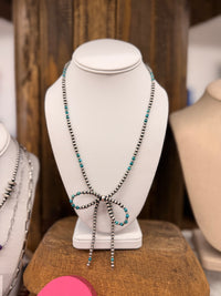 The June Bug Bow Pearls