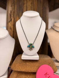 The Green and Blue Turquoise Thunder Bird