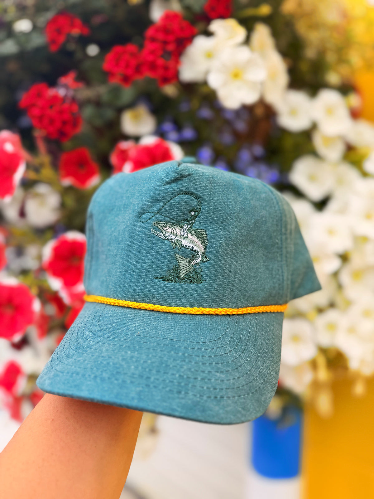 Cowboy riding a fish cap