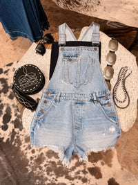 The Sonya Medium Wash Frayed Hem Overall shorts