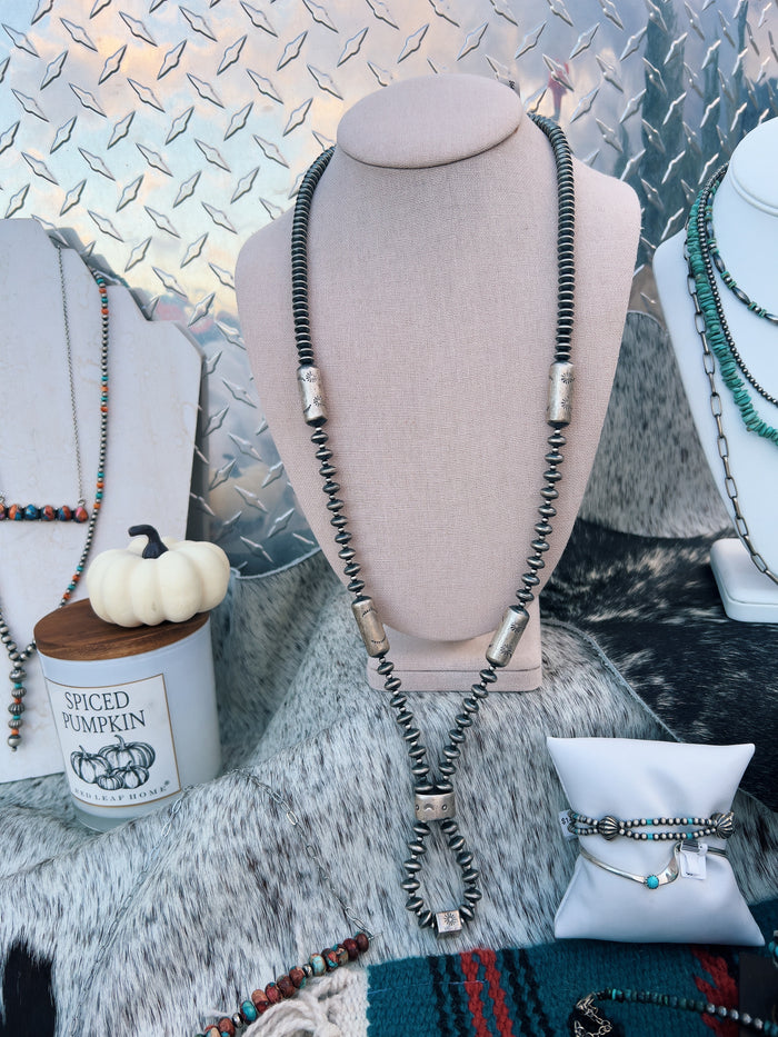 The Blaire Barrel Pearl Necklace w/ knot