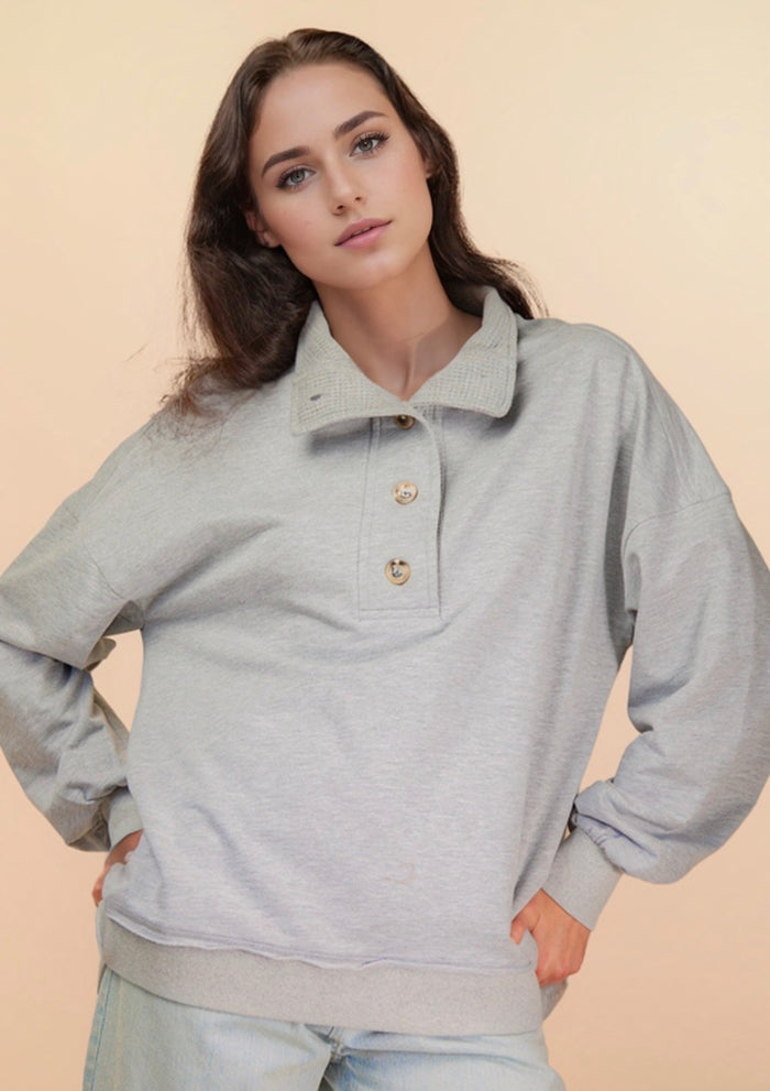 The Zayne’s Quarter Button up sweater