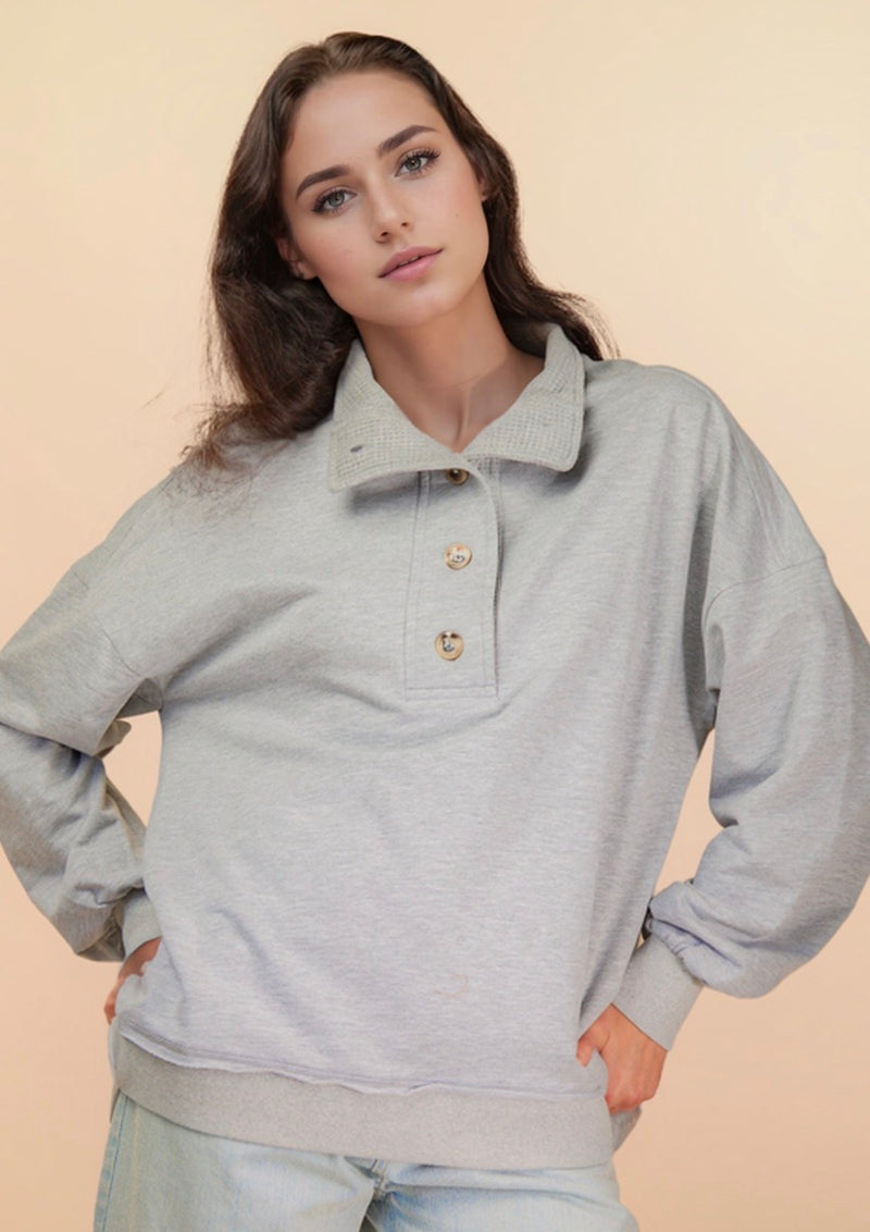 The Zayne’s Quarter Button up sweater