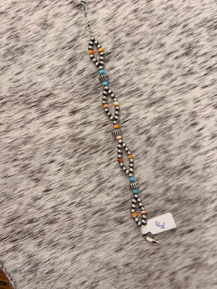 The Orange Spiny x Turquoise looped bracelet