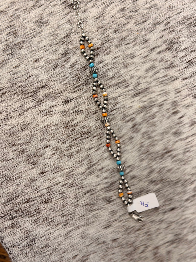 The Orange Spiny x Turquoise looped bracelet