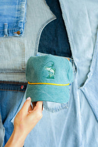 Cowboy riding a fish cap